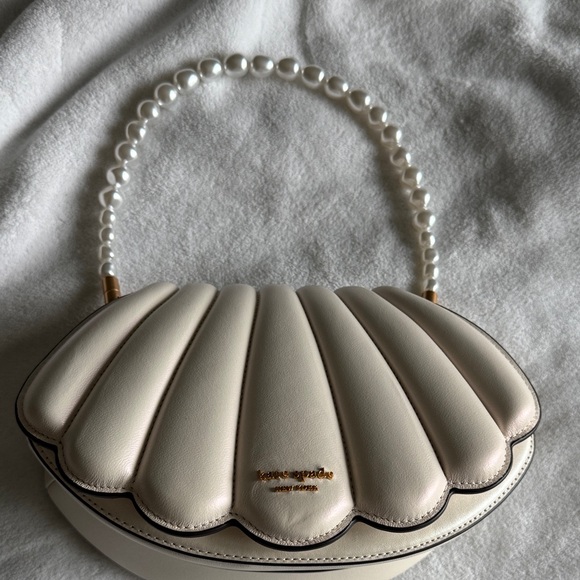 kate spade Handbags - Kate Spade Cream Scallop Shell Bag with Pearl Handle